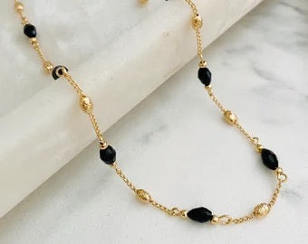 Bracelet CXL by Christian Lacroix – Perles noires et dorées