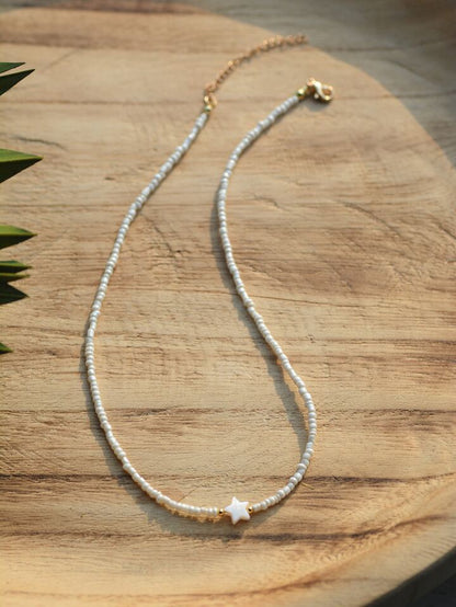 Collier ras-de-cou perles blanches et étoile nacrée – CXL by Christian Lacroix